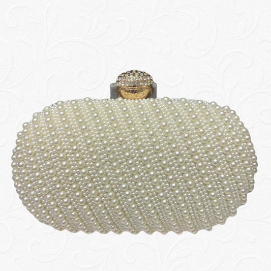 White pearl clutch with golden clasp for bridal and party wear